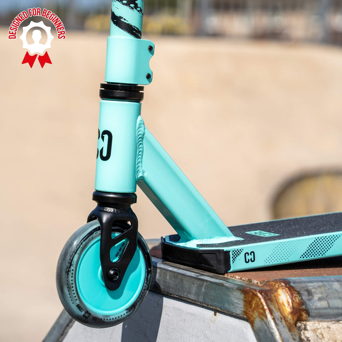 CORE CB1 beginner stunt scooter in teal and black