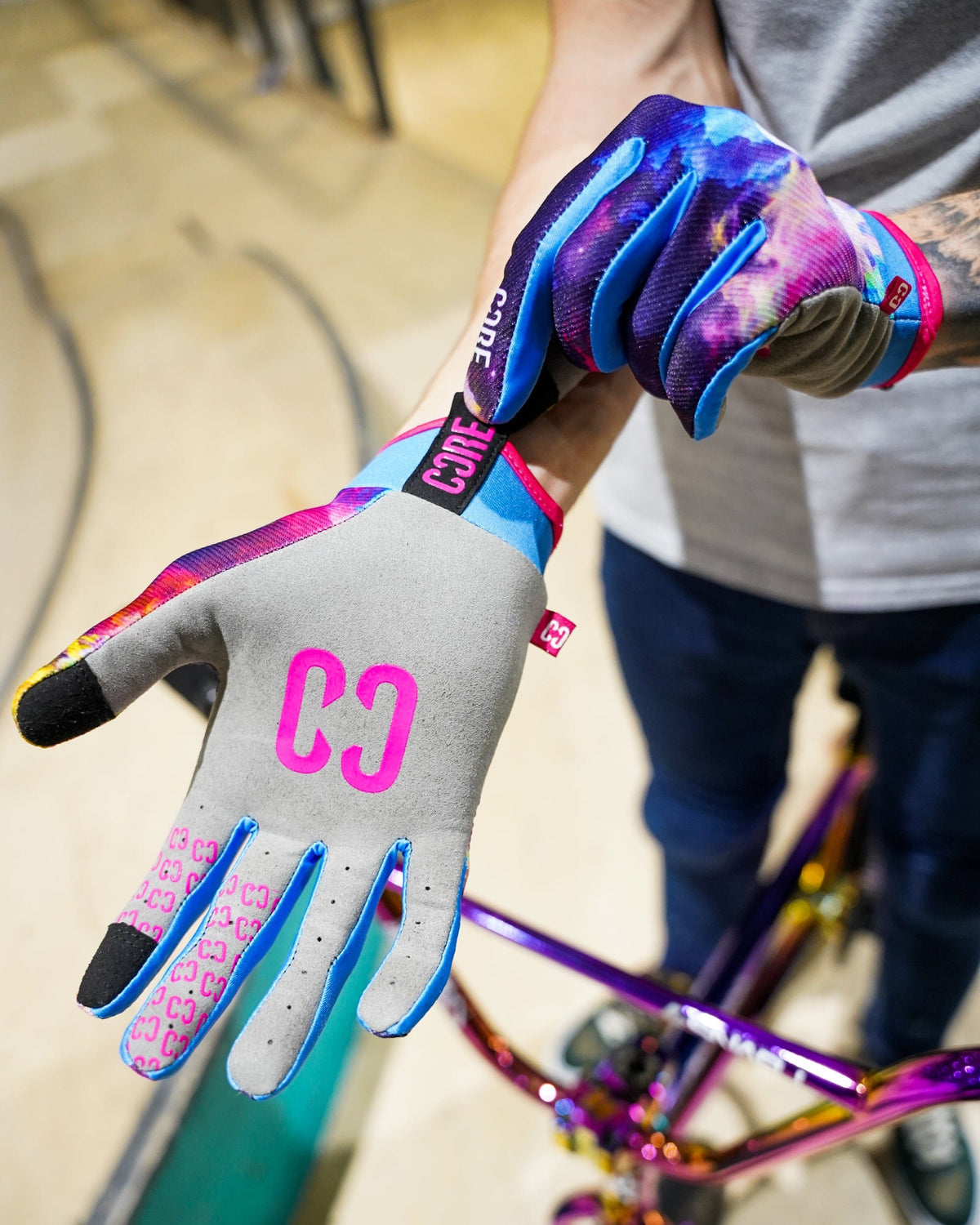 CORE Protection Aero BMX Gloves Neo Galaxy I Bike Gloves Putting Product On