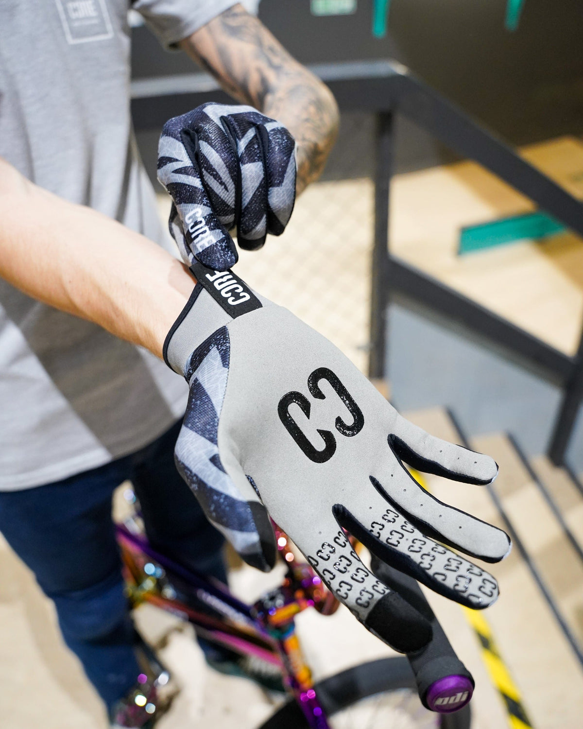 CORE Protection Aero BMX Gloves Zag I Bike Gloves Putting Product On