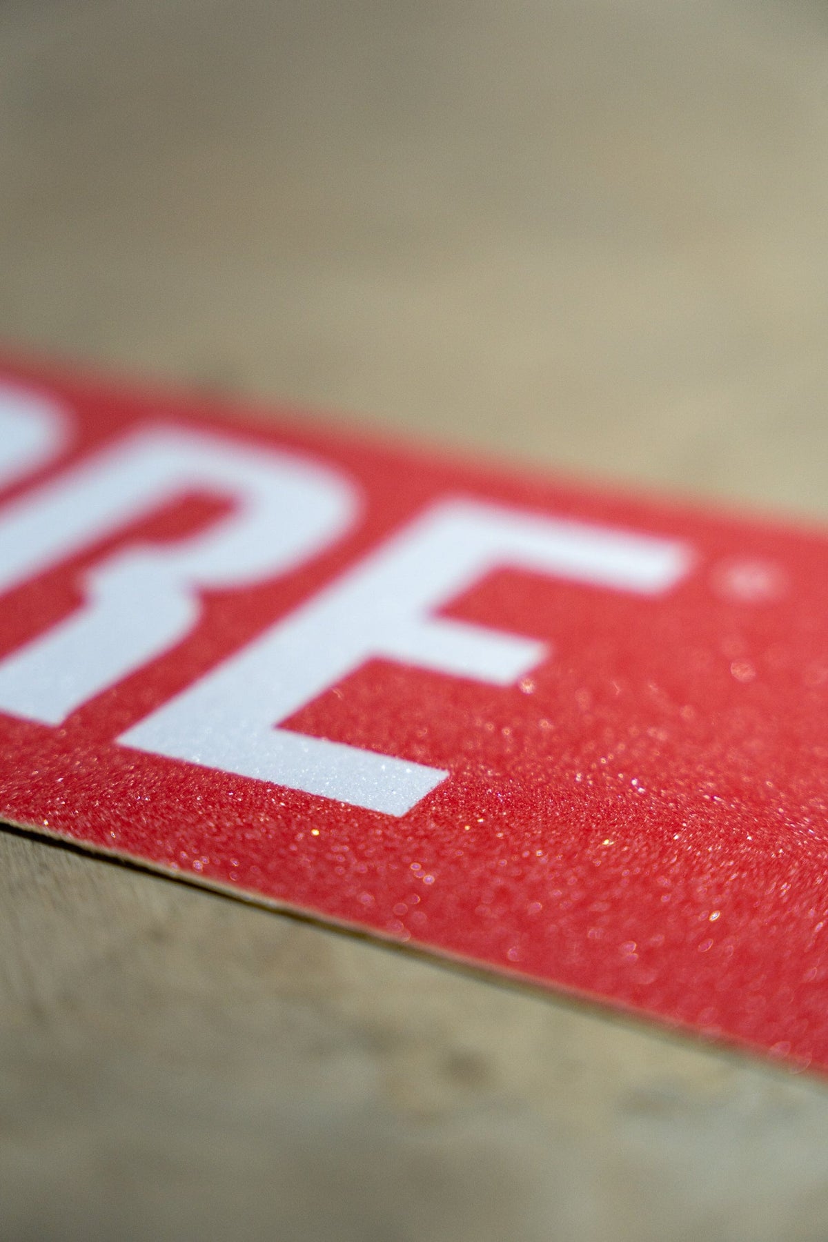 Core Scooter Grip Tape Classic Red I Grip Tape Scooter Zoomed in Logo