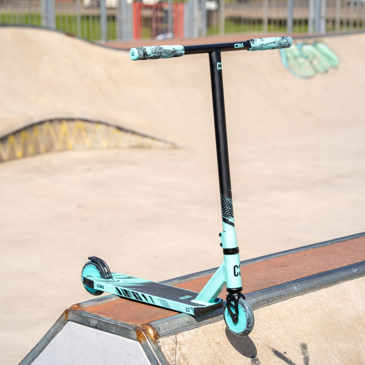 CORE CB1 beginner stunt scooter in teal and black