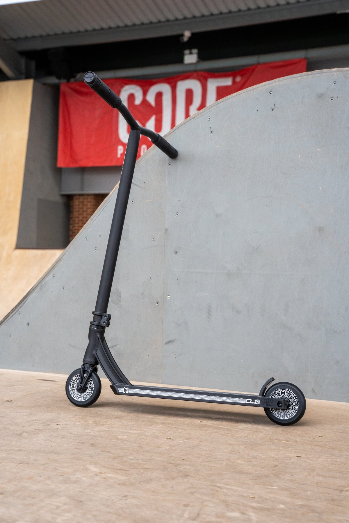 CORE CL1 complete stunt scooter in black - leaning