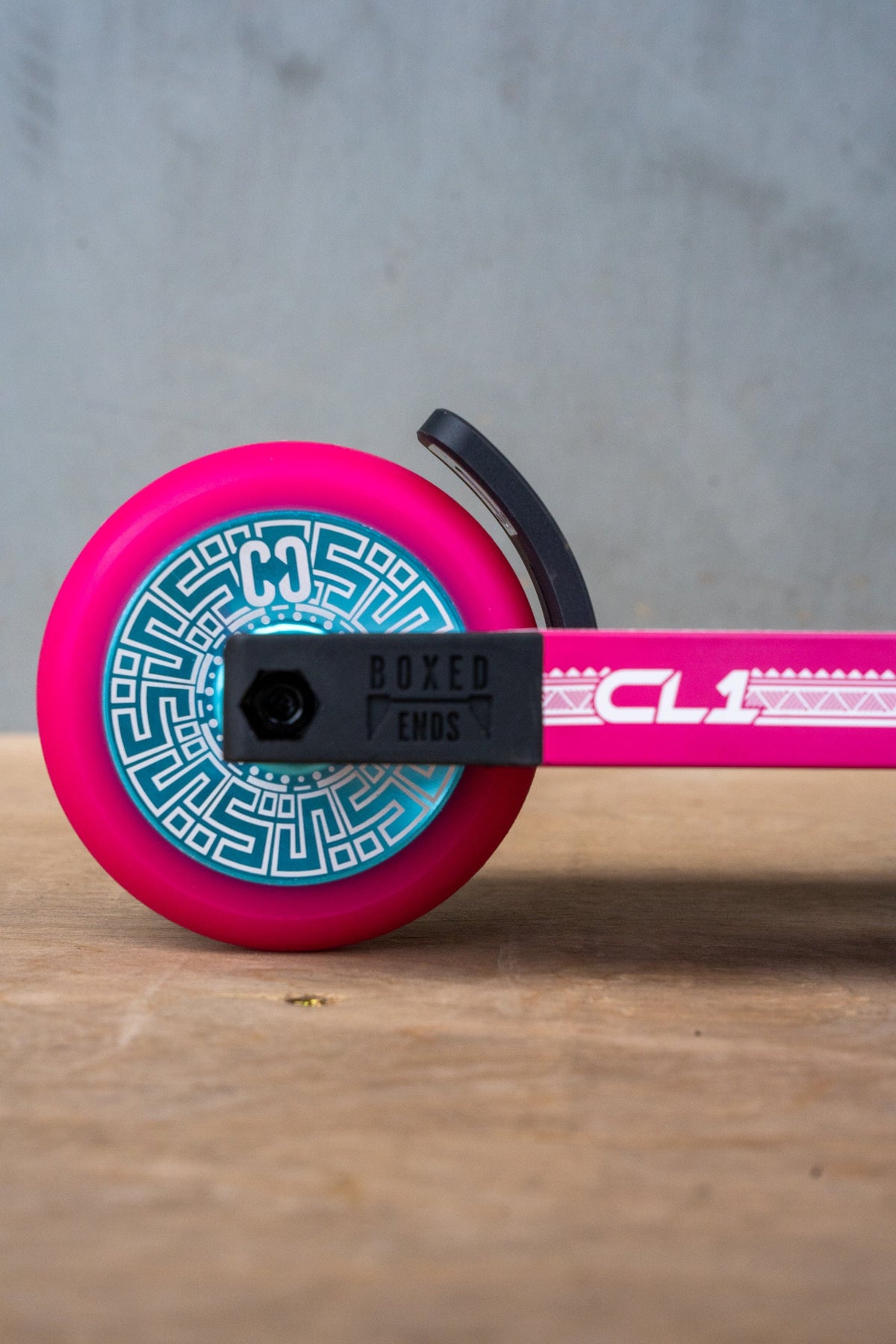 CORE CL1 complete stunt scooter in pink and teal - rear wheel detail